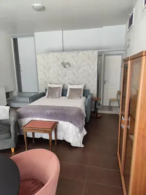 Un ou plusieurs lits dans un hébergement de l'établissement Chambre d'Hôtes du Bois Joli