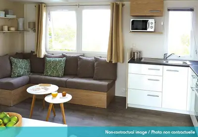 Cuisine ou kitchenette dans l'établissement Camping Officiel Siblu Le Bois Masson