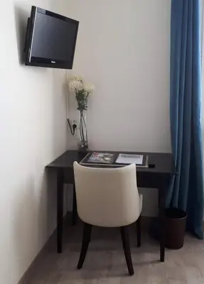 Télévision ou salle de divertissement dans l'établissement Hotel Le Goeland