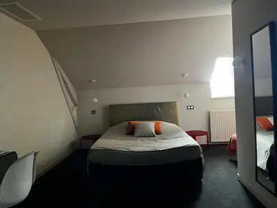 Un ou plusieurs lits dans un hébergement de l'établissement Maison Marie Barrault