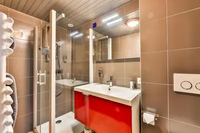 Salle de bains dans l'établissement Gite - Studios Marie Barrault