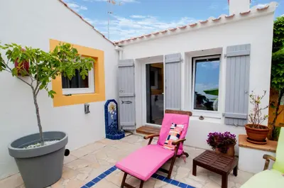 Coin salon dans l'établissement Les Yeux Bleus Bed & Breakfast