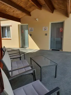 Coin salon dans l'établissement Chez les J-FOLAIS -Les Epesses - 3 kms Puy duFou