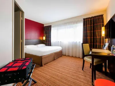 Un ou plusieurs lits dans un hébergement de l'établissement ibis Styles Nantes Centre Place Royale