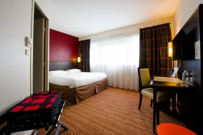 Un ou plusieurs lits dans un hébergement de l'établissement ibis Styles Nantes Centre Place Royale