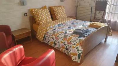 Un ou plusieurs lits dans un hébergement de l'établissement CHAMBRE D'HÔTES 20 MN PUY DU FOU