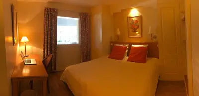 Un ou plusieurs lits dans un hébergement de l'établissement SWING RESIDENCE GOLF LA BAULE