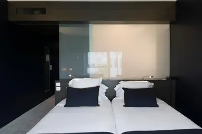 Un ou plusieurs lits dans un hébergement de l'établissement Hôtel Mercure Nantes Ouest Saint-Herblain Zenith