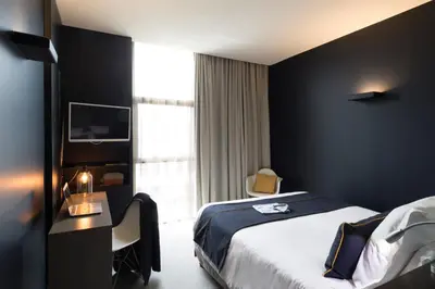 Un ou plusieurs lits dans un hébergement de l'établissement Hôtel Mercure Nantes Ouest Saint-Herblain Zenith