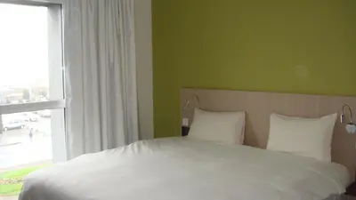 Un ou plusieurs lits dans un hébergement de l'établissement The Originals Access, Hôtel Cholet Gare