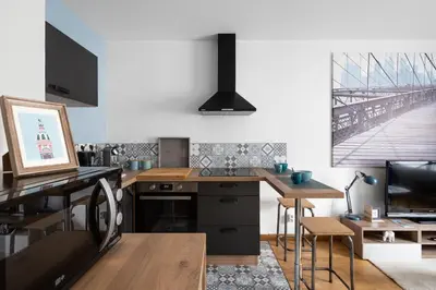 Cuisine ou kitchenette dans l'établissement Nelson by Cocoonr
