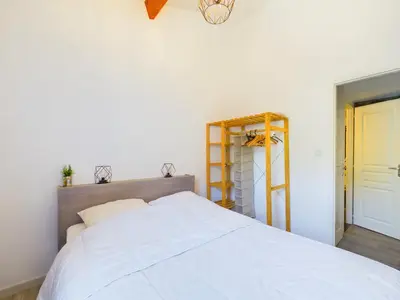 Un ou plusieurs lits dans un hébergement de l'établissement Maison pour 5, proche plage, piscine commune