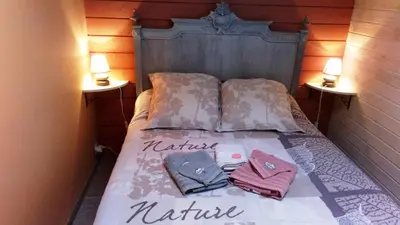 Un ou plusieurs lits dans un hébergement de l'établissement Au Coeur de la Nature