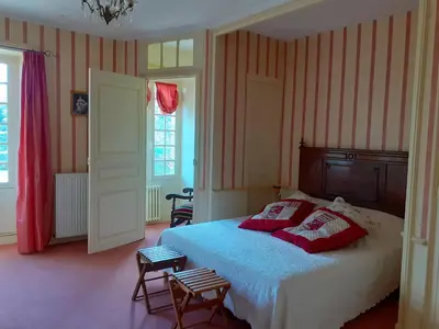 Un ou plusieurs lits dans un hébergement de l'établissement Château des Bretonnières sur vie - Maison d'hôtes et gîte 4 personnes