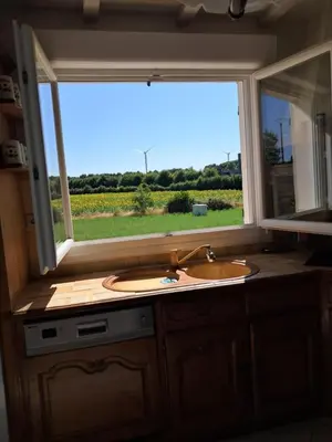 Cuisine ou kitchenette dans l'établissement Au Coeur du Bocage Vendéen