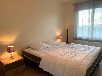 Un ou plusieurs lits dans un hébergement de l'établissement Bel appartement 1 chambre pour 5 personnes au bord de la mer à Saint-Jean-de-Monts - FR-1-323-216