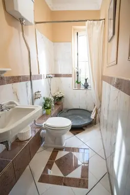 Salle de bains dans l'établissement Château de la Tourlandry
