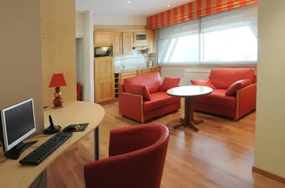 Télévision ou salle de divertissement dans l'établissement Logis Hotels, Hôtel Aquilon, Saint-Nazaire