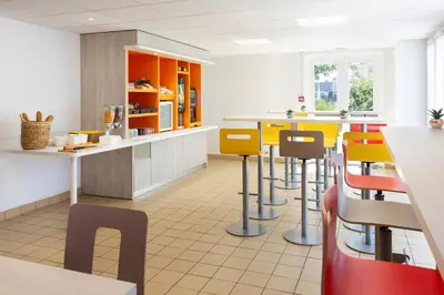 Restaurant ou autre lieu de restauration dans l'établissement Premiere Classe Nantes Ouest - St Herblain
