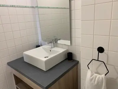Salle de bains dans l'établissement Le Saint Pierre