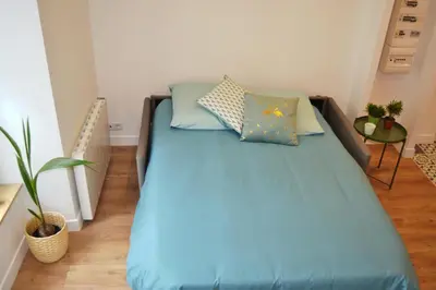 Un ou plusieurs lits dans un hébergement de l'établissement Appartement Amalfi Hyper Centre