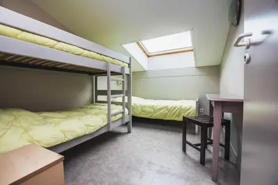 Un ou plusieurs lits dans un hébergement de l'établissement LE SOLEIL DE JADE village vacances