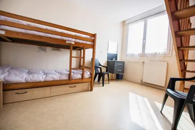 Un ou plusieurs lits dans un hébergement de l'établissement LE SOLEIL DE JADE village vacances
