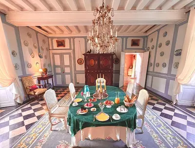 Coin salon dans l'établissement Château de Cadouzan