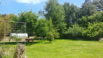 Jardin de l'établissement Maison spacieuse à Venansault avec jardin et terrasse