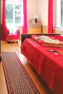 Un ou plusieurs lits dans un hébergement de l'établissement Maison spacieuse à Venansault avec jardin et terrasse