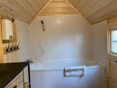 Salle de bains dans l'établissement Le Petit Moulin