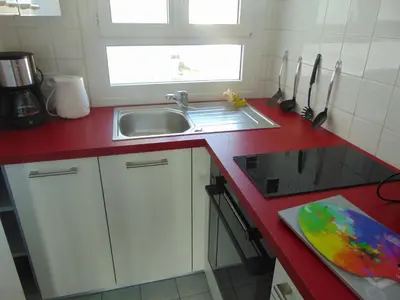 Cuisine ou kitchenette dans l'établissement appartement vue sur mer