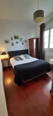 Un ou plusieurs lits dans un hébergement de l'établissement Hotel Restaurant Le Bosquet
