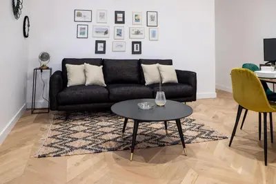 Coin salon dans l'établissement Hypercentre Charmant 2 Chambres Au Calme avec Joli Patio Privatif