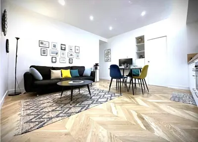 Coin salon dans l'établissement Hypercentre Charmant 2 Chambres Au Calme avec Joli Patio Privatif