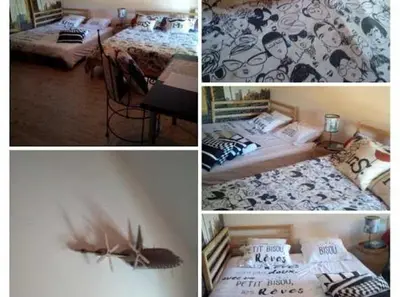 Un ou plusieurs lits dans un hébergement de l'établissement Aéroport chambre ,au calme