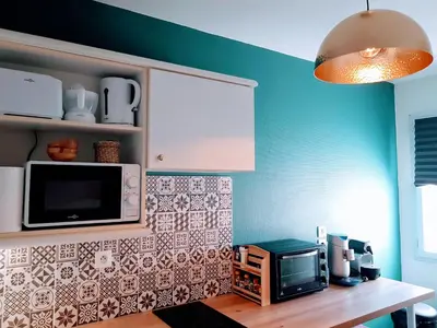 Cuisine ou kitchenette dans l'établissement L'Idylle : T2 de standing avec parking - Gare/Cité des Congrès/Lieu Unique