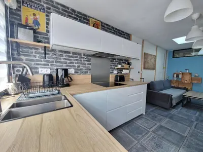 Cuisine ou kitchenette dans l'établissement GAEDREHOME