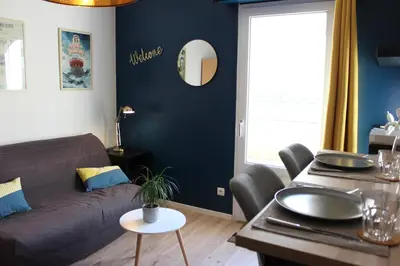 Coin salon dans l'établissement Studio Centre-Ville avec Terrasse et Parking Sécurisé Gratuit