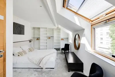 Un ou plusieurs lits dans un hébergement de l'établissement NOCNOC - Villa Paradis, piscine et rooftop au coeur de Nantes