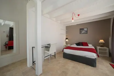 Un ou plusieurs lits dans un hébergement de l'établissement La Villa en L'île - 2 Piscines & Spa