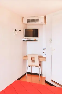 Télévision ou salle de divertissement dans l'établissement Premiere Classe Saint Nazaire - Trignac