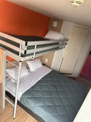 Un ou plusieurs lits dans un hébergement de l'établissement Premiere Classe Nantes Est St Sebastien Sur Loire
