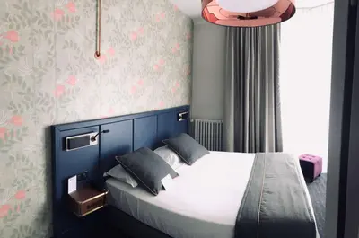 Un ou plusieurs lits dans un hébergement de l'établissement Best Western Hotel Graslin