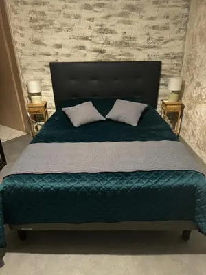 Un ou plusieurs lits dans un hébergement de l'établissement Chambre proche Puy du Fou