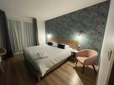 Un ou plusieurs lits dans un hébergement de l'établissement Hôtel des Dunes Noirmoutier