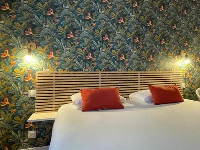Un ou plusieurs lits dans un hébergement de l'établissement Hôtel des Dunes Noirmoutier