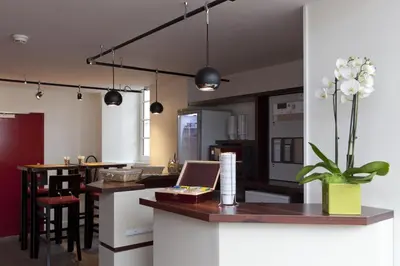 Cuisine ou kitchenette dans l'établissement Logis Hotel Chateaubriand