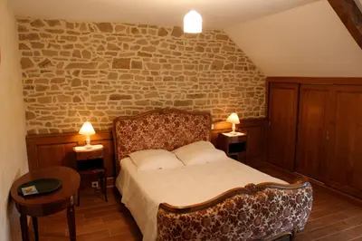 Un ou plusieurs lits dans un hébergement de l'établissement Chambres d'hôtes de Lunel
