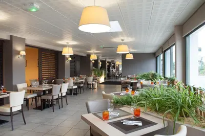 Restaurant ou autre lieu de restauration dans l'établissement L'Espadon
